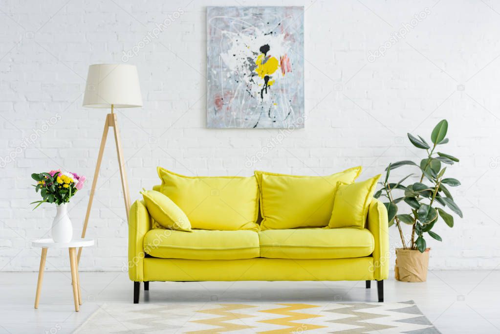 Modern living room styled with African furniture and decor accents
