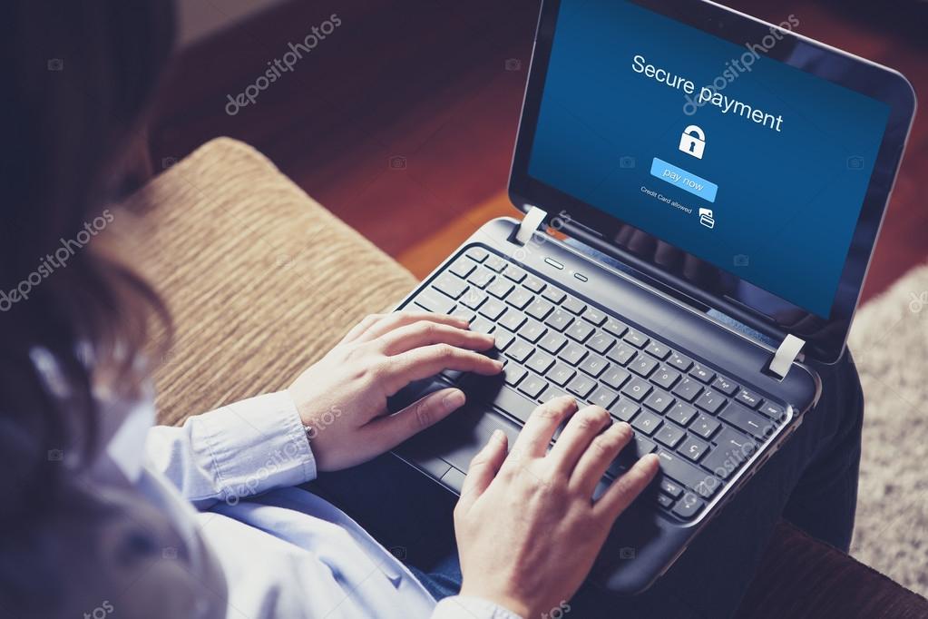 Close-up of a secure online payment being made on a laptop