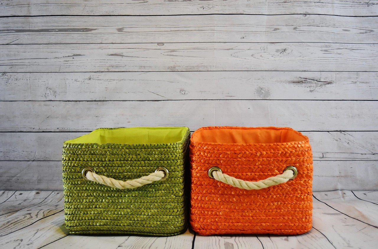 Set of two lidded woven African storage baskets