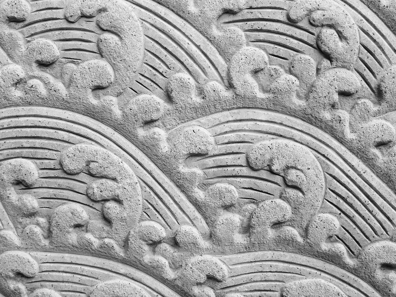 Rectangular wooden wall panel carved with Adinkra symbols